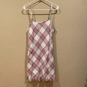 White, blue and red dress with adjustable straps and fringe.